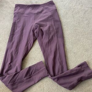 Purple leggings with mesh leg and pockets